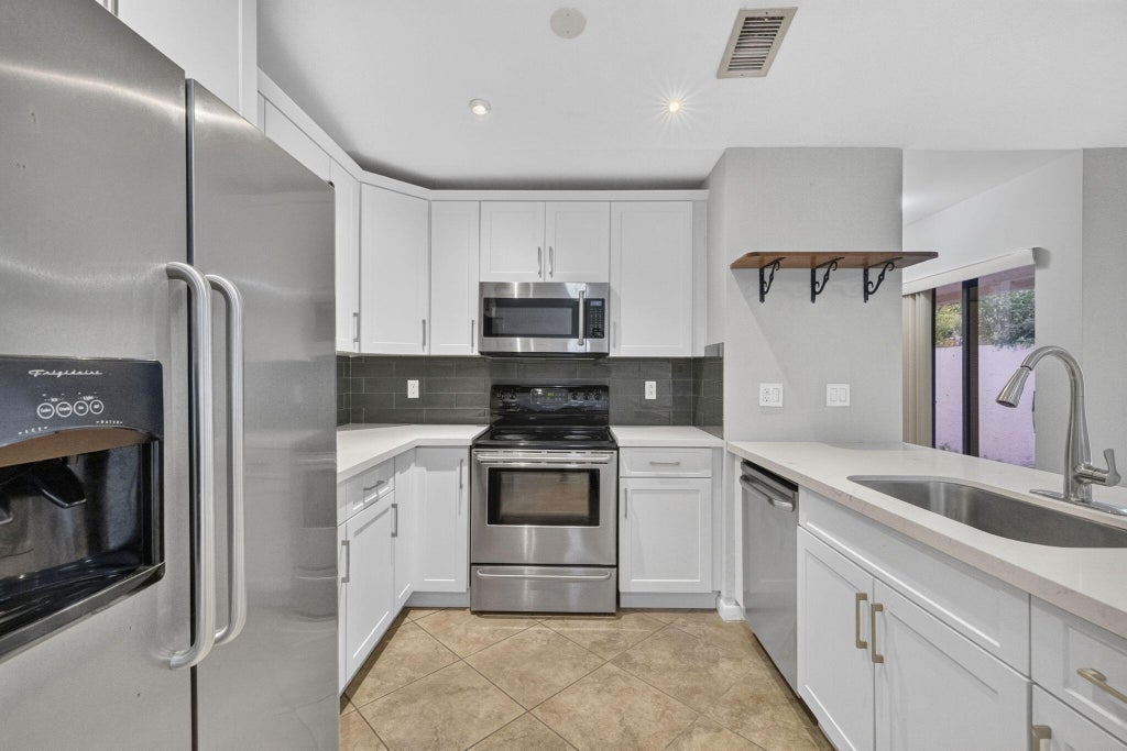 Photo of 3076 S Oakland Forest Drive #503, Oakland Park, FL 33309 (MLS # B26050690)