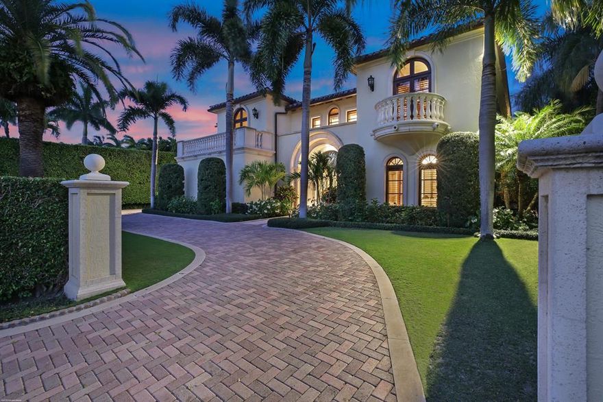 Enjoy the privacy of Everglades Island in this extraordinary 6 bedroom, 8-1/2 bath property with classic elegance and quality craftsmanship. This spacious floor plan with high ceilings, Tischler impact glass French doors, custom fireplace, and beautiful detailed ceilings make this property unique. The peaceful, lushly landscaped backyard overlooks the lake and the golf course making this the perfect setting for relaxing with family or entertaining friends! The large designer kitchen exudes quality with its Viking stainless steel stove, SubZero refrigerator/freezer, beautiful cabinetry and granite center island. Just off the kitchen, is a cozy breakfast area with built in seating for comfort and relaxation while enjoying your morning coffee. A generous sized family room is perfect for