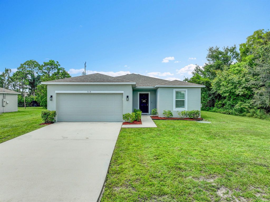 Photo of 360 SW Film Avenue, Port Saint Lucie, FL 34953 (MLS # R11105149)