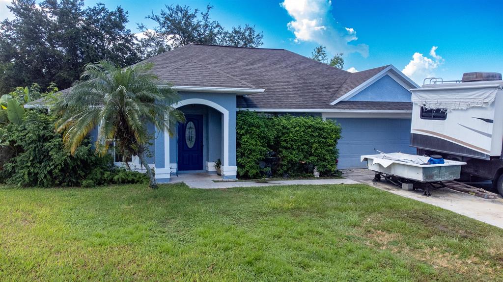 Photo of 4560 SW Oscar Court Ct, Port St Lucie, FL 34953 (MLS # R10822824)