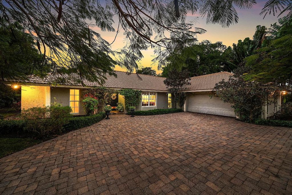 Photo of 416 S Country Club Drive, Atlantis, FL 33462 (MLS # R11158104)