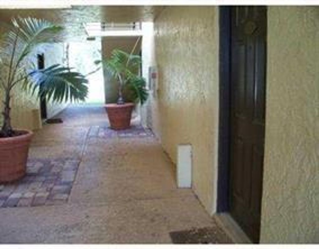 Photo of 641 Lyons Road #11-107, Coconut Creek, FL 33063 (MLS # F10531608)