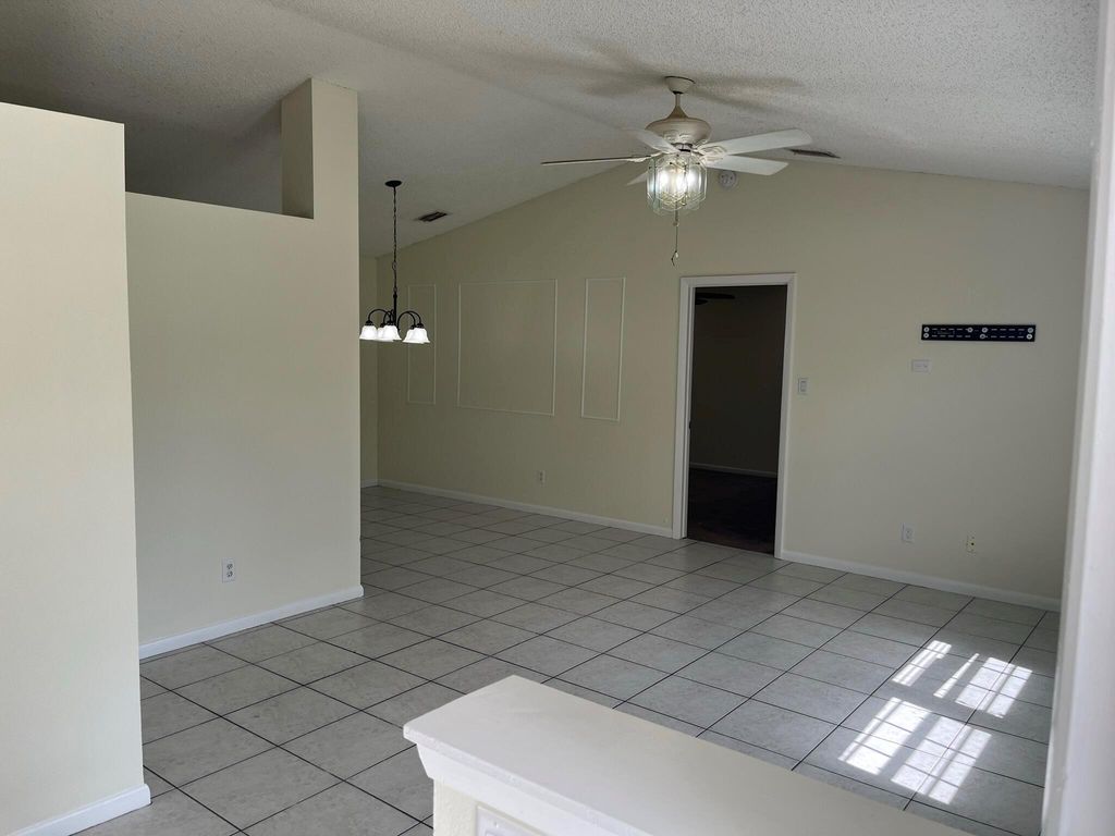 Photo of 101 NW Carmelite Street, Port Saint Lucie, FL 34983 (MLS # R10954596)