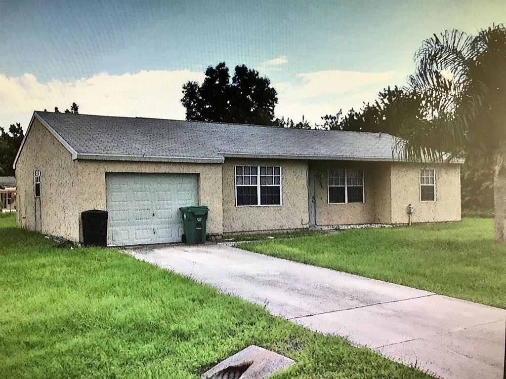 Photo of 2201 SE Baron Street, Port St Lucie, FL 34952 (MLS # R10924899)
