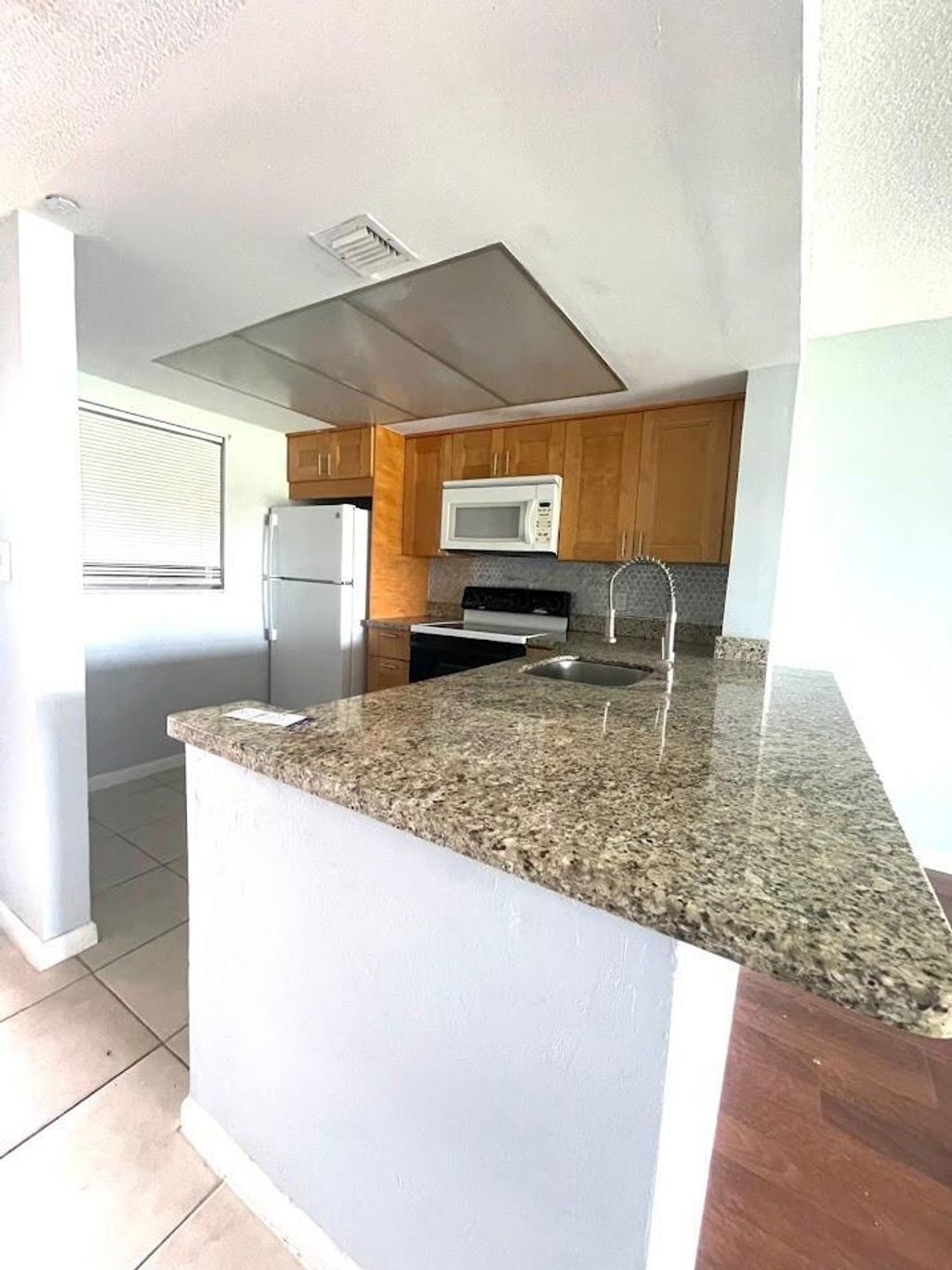 Photo of 1101 Crystal Lake Drive #205, Pompano Beach, FL 33064 (MLS # R11095166)