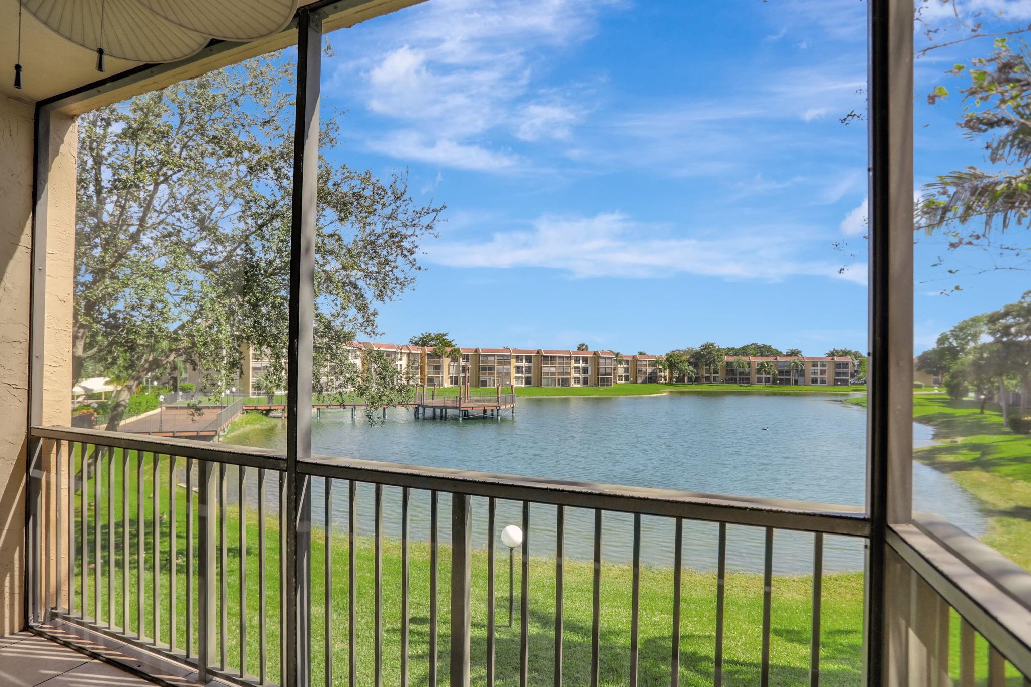2006 CONSTRUCTION. NEWEST BUILT CONDO AROUND. 9 FOOT HIGH CEILINGS "ALL" IMPACT WINDOWS IMPACT FRONT DOOR, 8 BY 12 FOOT WIDE IMPACT SLIDING GLASS DOOR FANTASTIC VIEW LAKE SUNDECK & POOL. SPRINKLER SYSTEM & 4 SMOKE ALARMS BUILT UNDER NEWER 2006 BUILDING CODE. GRANITE COUNTER 8 FOOT BREAKFAST BAR. WOOD CABINETS. UPGRADE FRONT LOADING WASHER DRYER 4 CLOSETS MAIN BDRM DELUXE CLOSETS BUILT-IN SHELVING. GLASS ENCLOSED SHOWER BUILT IN SEAT IN SHOWER. 4 UPGRADE CEILING FANS & REMOTE CONTROLS BATHS: 11 X 7 INCH TILE; UPGRADED GERBER COMMODES; CULTURED MARBLE & WOOD VANITIES UPGRADED FAUCETS. PRACTICE FREE THROWS & JUMP SHOTS FOR 1 ON 1 HALF COURT WITH JUNIOR. MOVE IN READY. CALL ME NOW & SEE YOU WILL BE GLAD YOU DID. Assoc Fee: $572. PER MONTH.