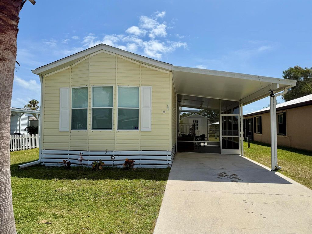 Photo of 33 SE Flamenco Way, Port Saint Lucie, FL 34952 (MLS # R11084255)