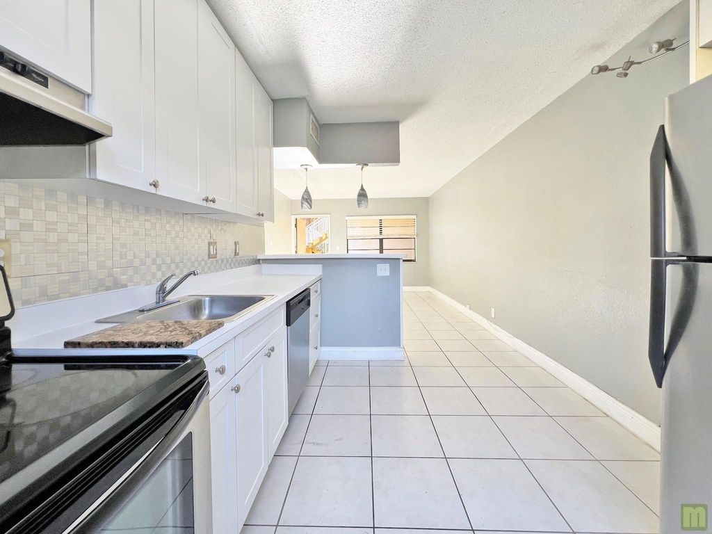 Photo of 4061 N Dixie Highway #12, Oakland Park, FL 33334 (MLS # F10484078)