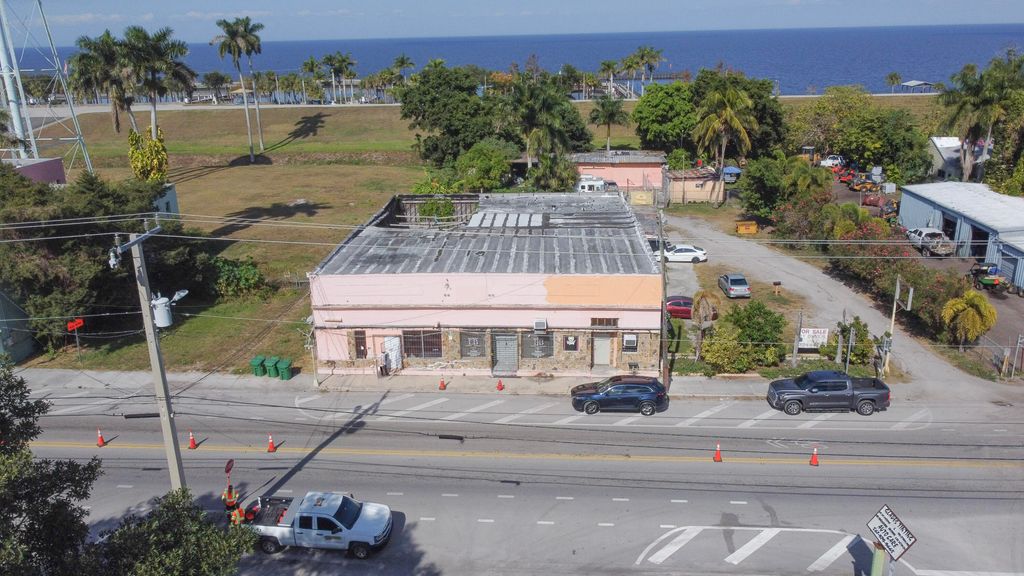 Photo of 185 E Main Street, Pahokee, FL 33476 (MLS # R11144768)
