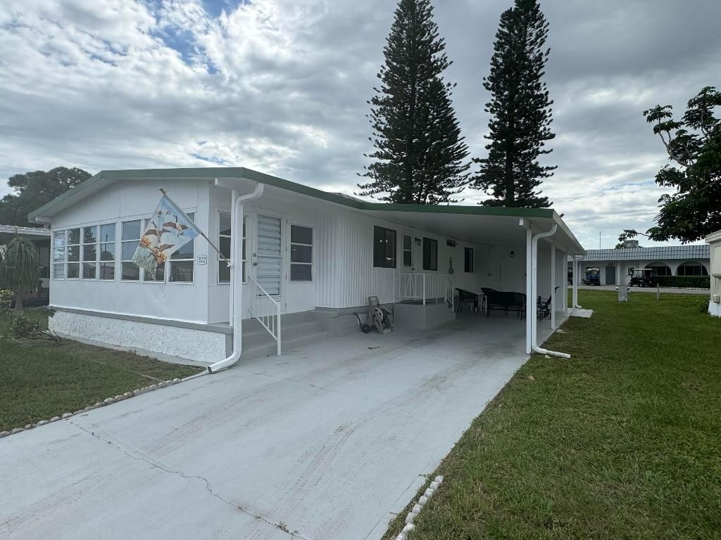 Photo of 322 S Erie Dr, Fort Pierce, FL 34946 (MLS # R11075747)