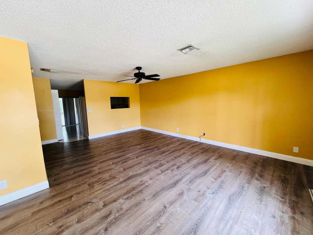 Photo of 5855 Timber Valley Drive, Lake Worth, FL 33463 (MLS # B26061313)