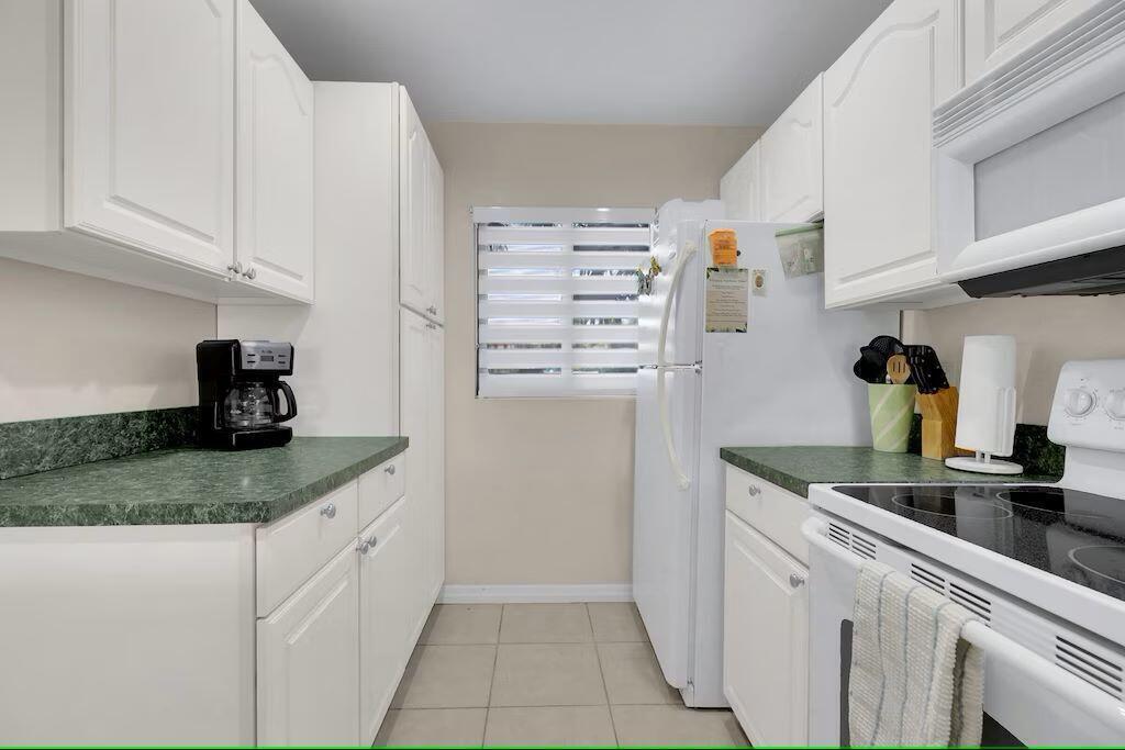 ATLANTIS CONDOMINIUM BUILDING A - Residential Lease