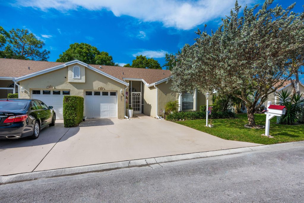 Photo of 3517 Mill Brook Way Circle, Greenacres, FL 33463 (MLS # B26017086)
