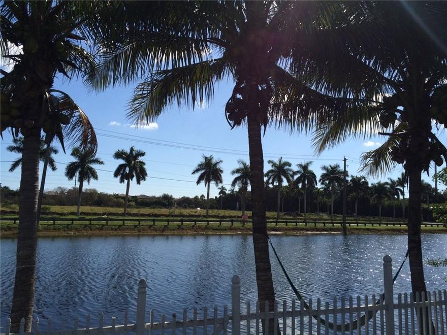 A nice home in a central location, updated and clean.The house is located close to places of worship and shopping area .Water front of a canal , and a huge inclosed patio is great for entertainment .