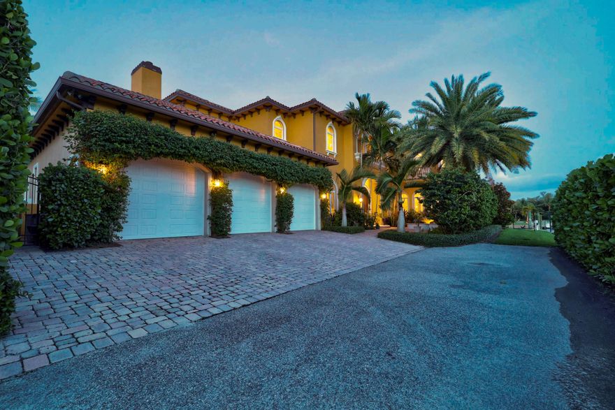 DEEP WATER - Boater's Paradise!  Located in HOBE SOUND, FL this Magnificent Custom built two-story CBS home with elevator, is situated on the Intracoastal Waterway with breathtaking views of Jupiter Island.  This point lot is surrounded by water on three sides with two deep water docks.  It includes a protected 110' dock, 8ft depth, with twin 50 amp electric as well as a 60' dock with 30 amp service. 2 boat lifts; 16k and 3k. Impact Glass, Covered patio with Outdoor kitchen. Secure room with CCTV & a Fort Knox safe. Colombian tile roof, Marble flooring from Valencia, Spain. Gourmet chefs kitchen. Mature landscaping, 4 open patio areas, large pool deck area and private white sandy beach to launch kayaks & paddleboards. NO MANGROVES