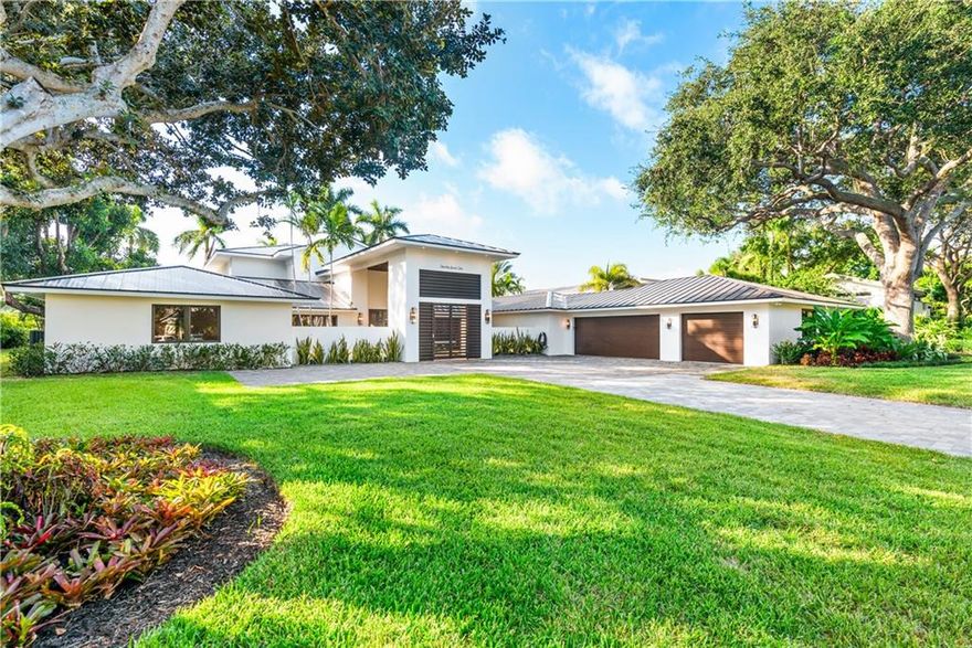 One of a kind estate located directly on the 9th hole at Coral Ridge Country Club.100% renovated with no expense spared. 7,500 square feet under air, 6 bedrooms, 6.5 bathrooms, 1/2+ acre lot, 3 car garage, butler's pantry, double island chef's kitchen, Thermador appliances, two master suites, all day sun pool, aluminum roof, generator ready and amazing views of CRCC golf course and clubhouse. Unmatched detail and design throughout. .