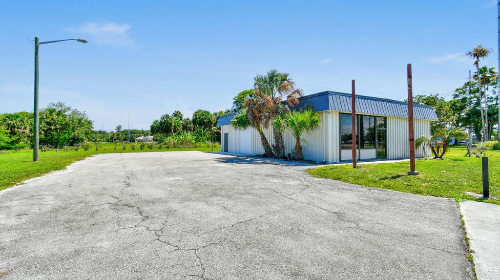 Photo of 3801 OKEECHOBEE Road, Fort Pierce, FL 34947 (MLS # B26053975)