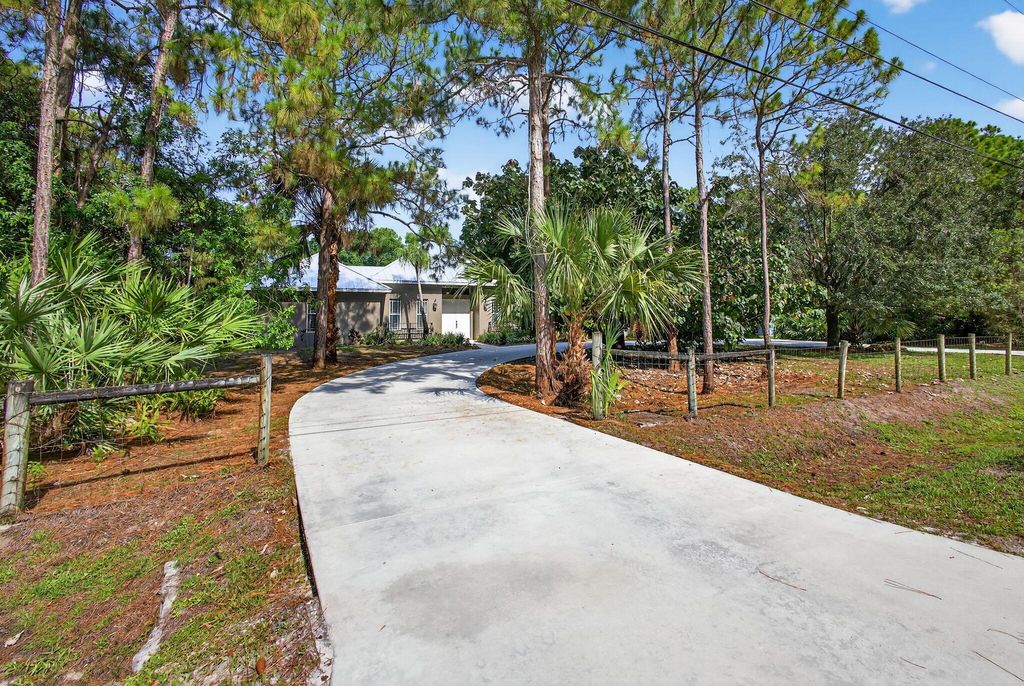 Photo of 16171 133rd Drive N, Jupiter, FL 33478 (MLS # R11106013)