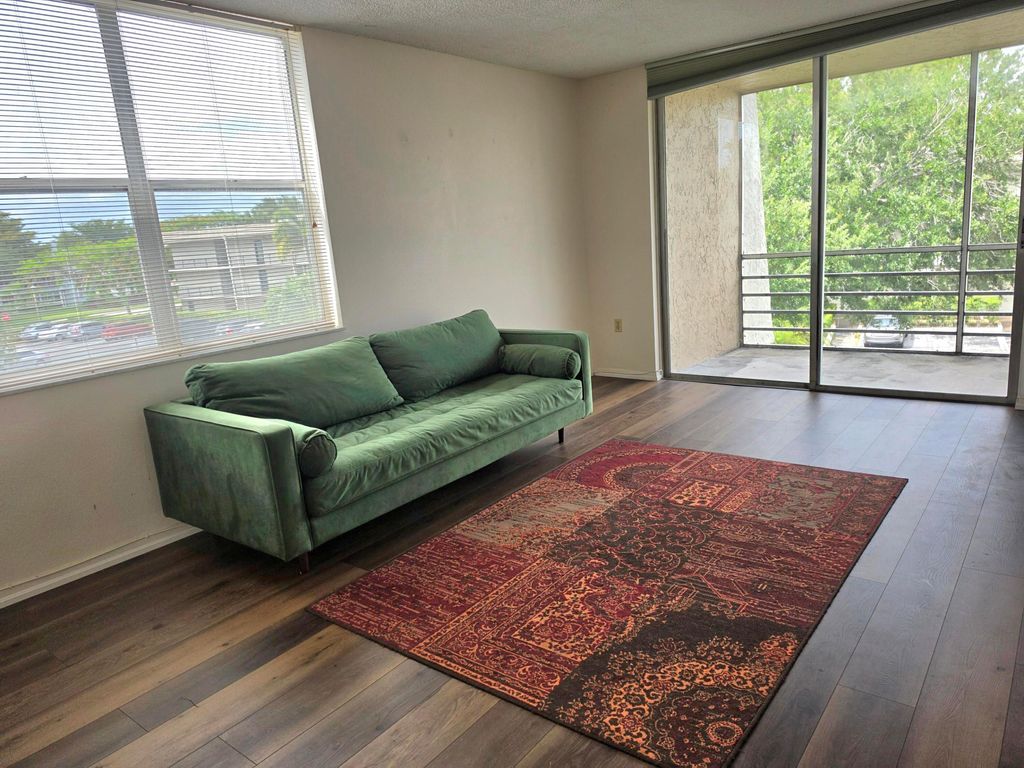 Photo of 9330 Lime Bay Boulevard #301, Tamarac, FL 33321 (MLS # B26028839)