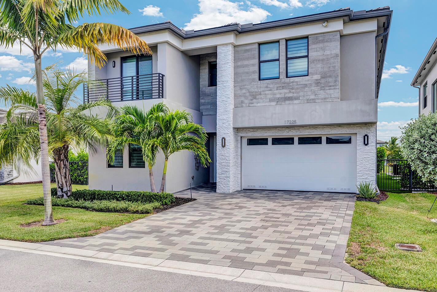 Live in luxury in this Polynesia model home in the prestigious Lotus community. Offering 5 bedrooms, 7 bathrooms, a private pool, and a large yard with lake views, this home is designed for comfort and entertaining. The chef's kitchen with island provides plenty of space for everyday living. Enjoy the benefits of a gated, active lifestyle community with a resort-style clubhouse, on-site restaurant and bar, fitness, sports, and more. Experience the ultimate rental opportunity in one of Boca's most sought-after communities.