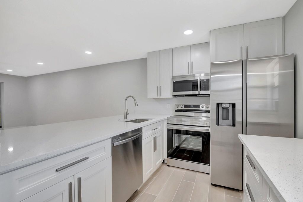 Photo of 2601 NE 3rd Court #105, Boynton Beach, FL 33435 (MLS # R11073947)