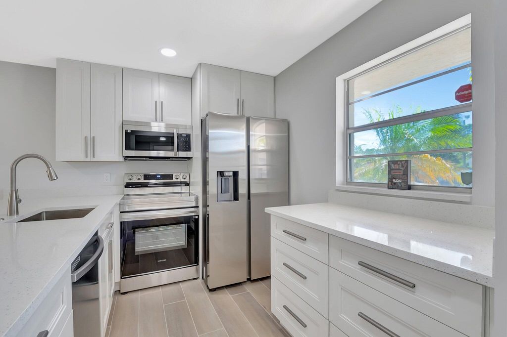 Photo of 2601 NE 3rd Court #105, Boynton Beach, FL 33435 (MLS # R11073947)