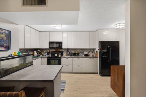 Photo of 5486 COURTYARD Drive #5486, Margate, FL 33063 (MLS # B26084429)