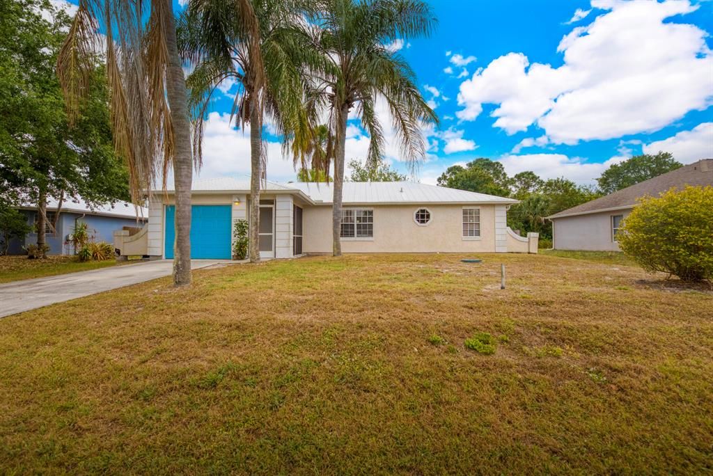 Photo of 2049 SW Aguero Street, Port Saint Lucie, FL 34953 (MLS # R10874358)