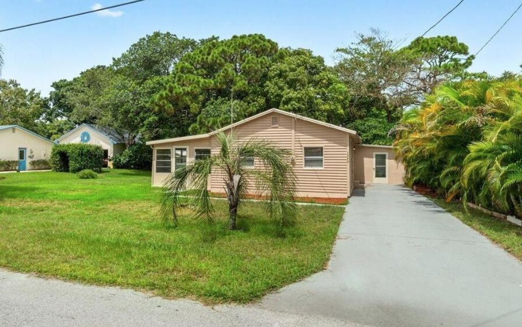 Photo of 1340 NW Antoch Avenue, Stuart, FL 34994 (MLS # R10806309)