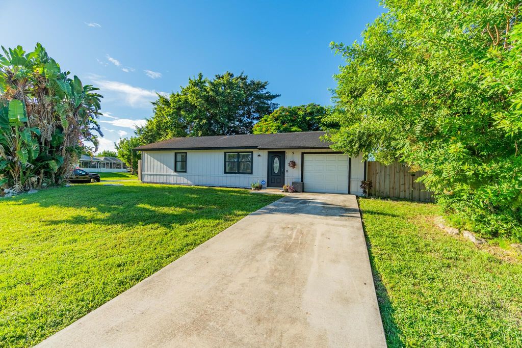 Photo of 902 SW Nichols Terrace, Port Saint Lucie, FL 34953 (MLS # R11126178)