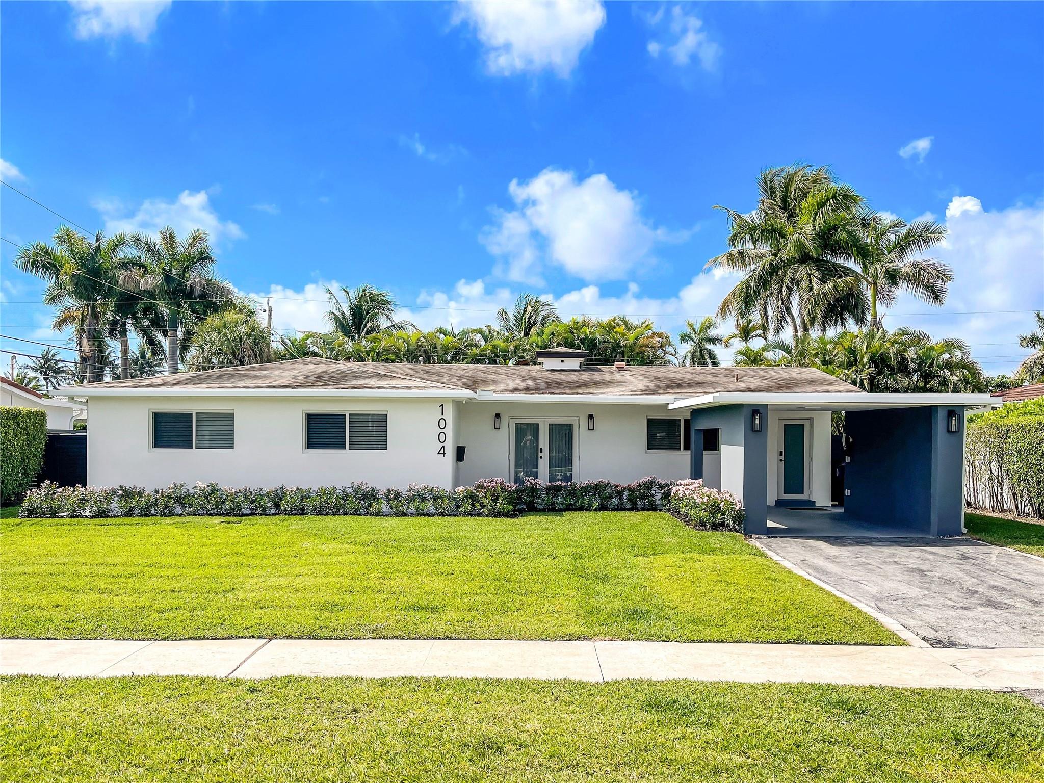 Nestled in the highly desirable East Boca Raton neighborhood, this truly unique & beautifully renovated home offers a generous, luxurious living space in the heart of town. It is the perfect blend of privacy and convenience. The open floor plan effortlessly flows between the living, dining, and kitchen areas, creating a warm, welcoming space ideal for both relaxation & entertaining. The chef-inspired kitchen features a stunning waterfall quartz countertop, plenty of seating, and sleek top-of-the-line appliances. With impact windows and doors throughout, this home ensures both storm protection & energy efficiency. This peaceful, secluded residential neighborhood is within minutes of the beach, shopping, Town Center Mall, renowned Mizner Park, Brightline, and all dining. Must see!