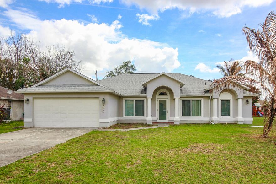 Welcome to 3455 SW Galeti Street, a spacious and well-cared-for 3-bedroom, 2-bath, 2-car garage home in a desirable southwest Port St. Lucie neighborhood. For added peace of mind, the owner has already taken care of the major updates, including a new roof (2021), impact windows and doors (2021), new A/C (2026), and solar panels that help keep the electric bill low and will be paid off at closing. Conveniently located just minutes from Tradition and I-95, this home offers both comfort and convenience for everyday living and commuting. Inside, you'll find plenty of space with a separate living room, dining room, family room, and an eat-in kitchen with a breakfast nook.  The primary suite offers a relaxing retreat with a soaking tub, separate shower, and a walk-in closet with a stylish barn door. Enjoy Florida living on the screened patio overlooking the large backyard, with plenty of room to entertain, garden, or simply unwind. This is a wonderful opportunity to own a move-in ready home in a great Port St. Lucie location.