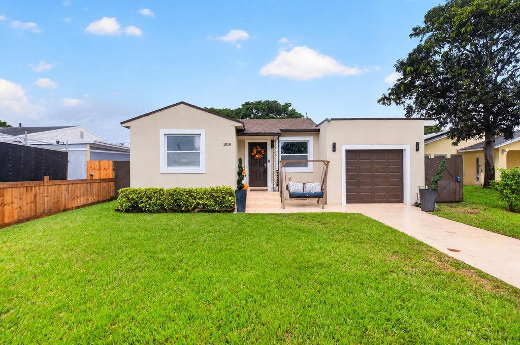 Photo of 1019 S C Street, Lake Worth Beach, FL 33460 (MLS # B26083674)