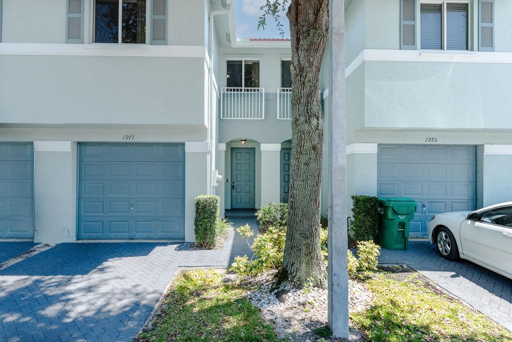 Photo of 1971 Alamanda Way, Riviera Beach, FL 33404 (MLS # R10801919)