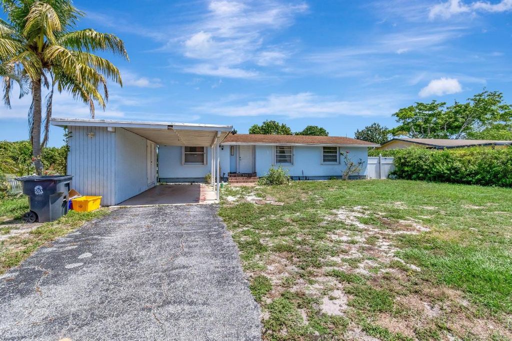 Photo of 3935 Chickasha Road, Atlantis, FL 33462 (MLS # R11091828)