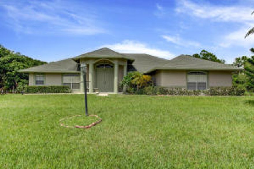 BEAUTIFUL 4 BEDROOM, 2 BATHROOM HOME ON PAVED OF CITRUS GROVE BLVD.  FULLY FENCED 1.19 ACRE PROPERTY.  EXCELLENT CONDITION - NEW A/C UNIT, UPGRADED WATER SYSTEM, NEW HOT WATER HEATER, AND THE ENTIRE EXTERIOR OF THE HOME HAS BEEN FRESHLY PAINTED.  PERFECT FLOOR-PLAN WITH PLENTY OF LIVING AREAS AND SPACIOUS KITCHEN.