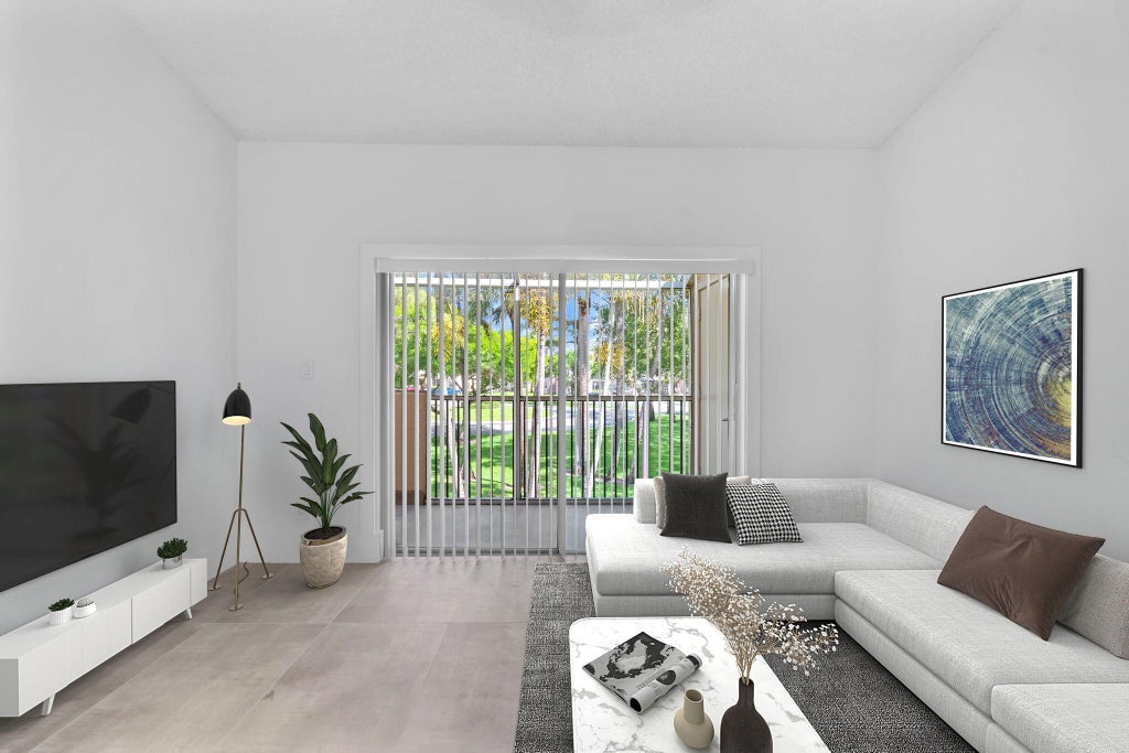 Photo of 671 Cypress Lake Boulevard #L21, Deerfield Beach, FL 33064 (MLS # B26037608)