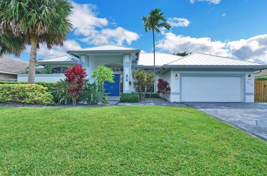 Photo of 519 N Cypress Drive, Tequesta, FL 33469 (MLS # R10751609)