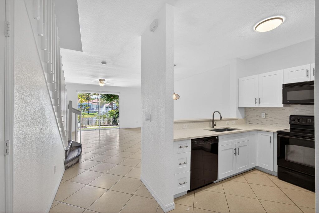 Photo of 3557 Oleander Terrace, Riviera Beach, FL 33404 (MLS # B26029430)