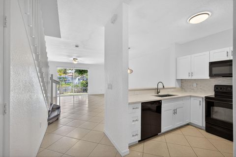 Photo of 3557 Oleander Terrace, Riviera Beach, FL 33404 (MLS # B26029430)