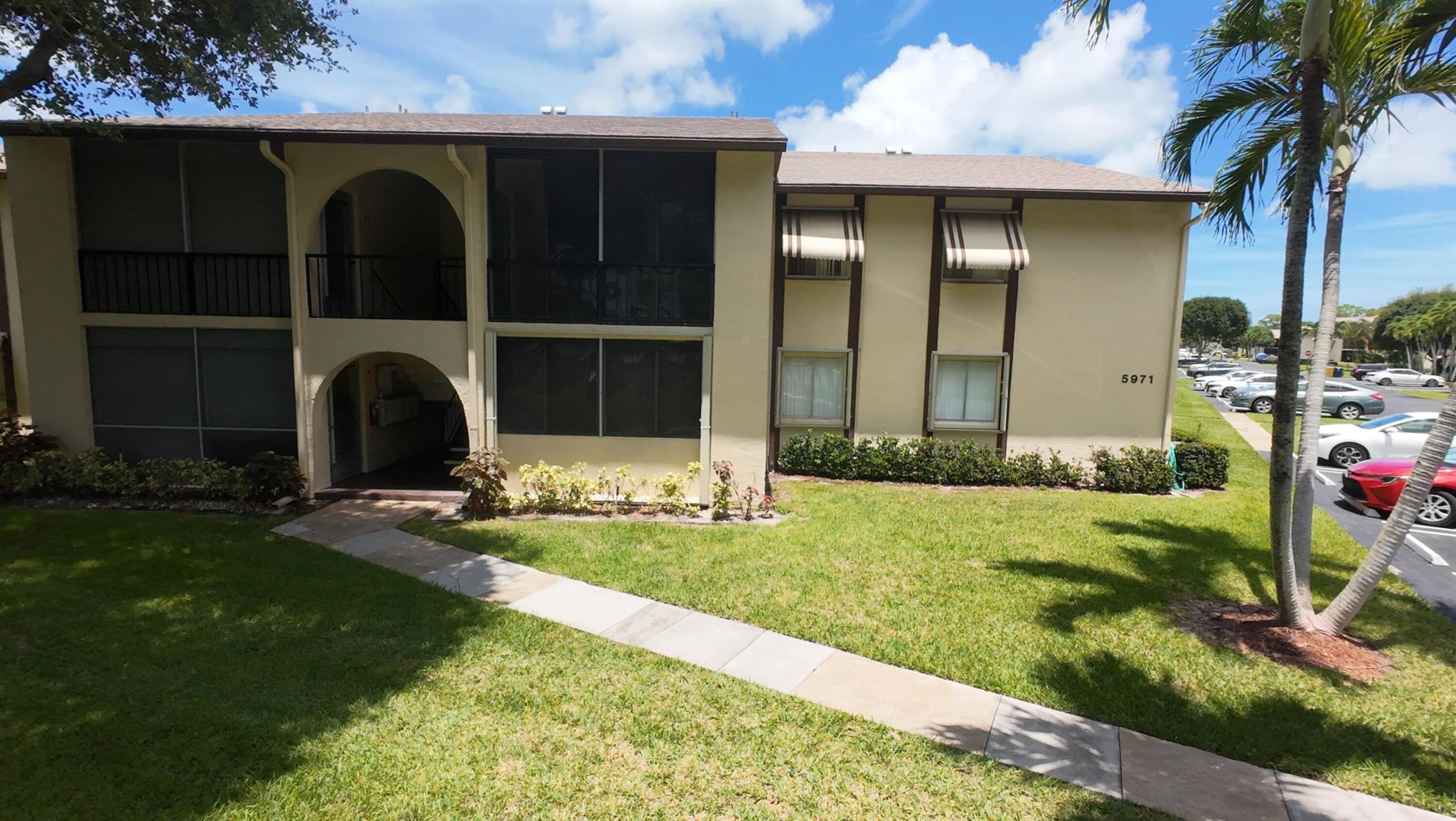 Beautifully maintained 2BR/2BA ground-floor unit in a desirable 55+ community in Greenacres. Move-in ready with new carpet, bathroom with updated vanities, fresh paint, new dishwasher & appliances in good conditions. Full hurricane shutters, updated A/C (2019), water heater (2018), Updated Electrical Panel. Enjoy a peaceful setting with walking paths, clubhouse, pool, and shuffleboard, plenty of guess parking located in front of the building. Conveniently located near supermarkets, restaurants, beaches, and downtown West Palm Beach, plus nearby cities like Boynton, Delray, and Boca. Low HOA. Cable & internet are included in the association fee. A perfect as primary residence or a seasonal home. DON'T MISS IT!!!