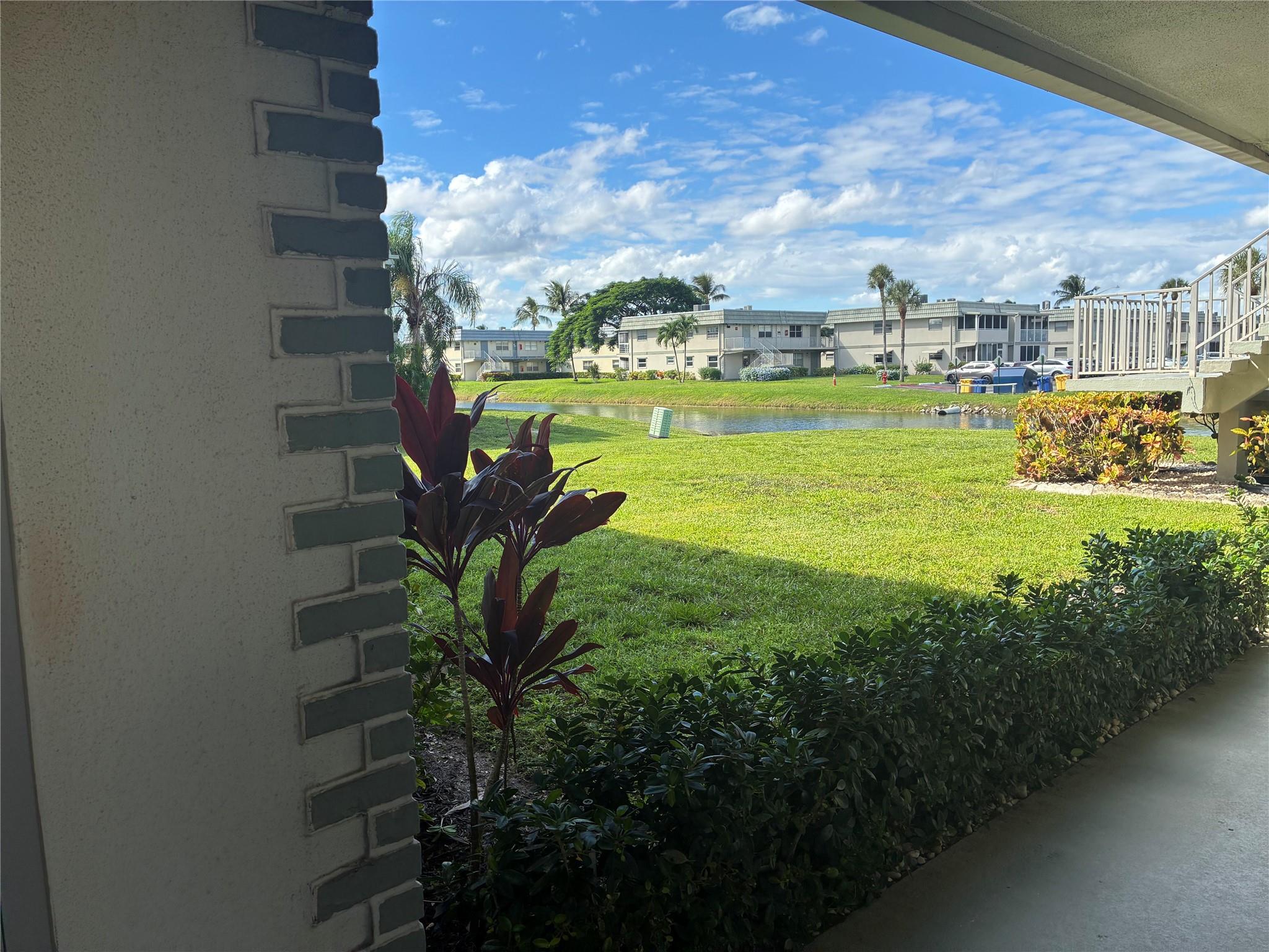 Stunning fully permitted, gutted & renovated 1st-floor corner unit in Kings Point! Ideal as a residence or investment—rent immediately with ~7% CAP rate. Water views from the bedroom windows and porch and hallway. Features all-new appliances, LED lighting, open quartz kitchen with custom cabinets & ample storage. Enjoy a beautiful walk-in shower, abundant outlets, and an enclosed porch with AC overlooking lush garden and canal. No detail overlooked! Located in a vibrant 55+ community with 3 heated pools, indoor/outdoor Jacuzzis, golf, theaters, clubs, and endless social activities. A must-see gem!