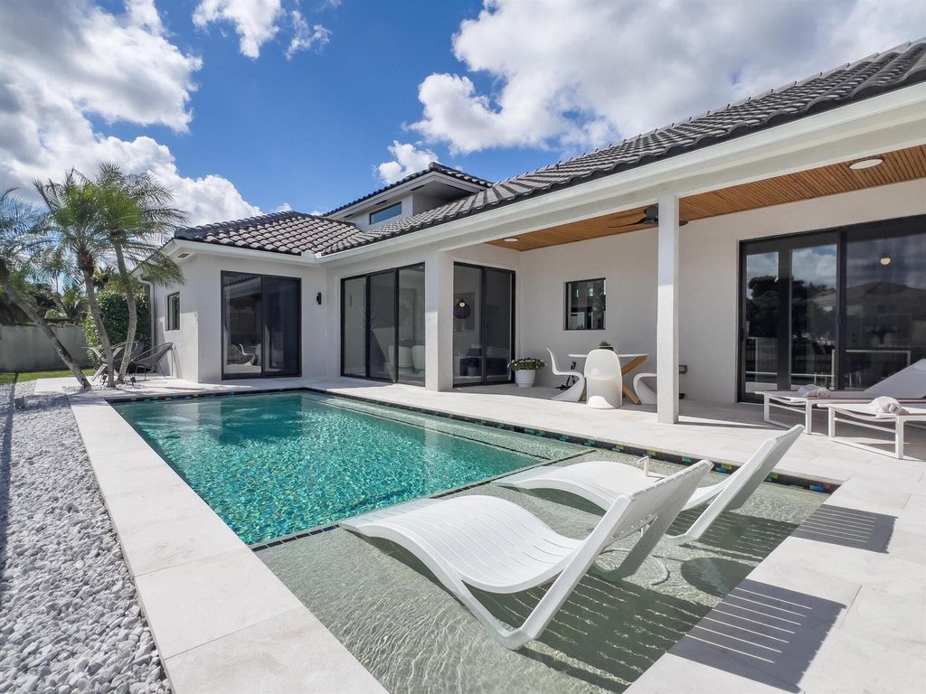 Photo of 10940 Haydn Drive, Boca Raton, FL 33498 (MLS # R11062515)