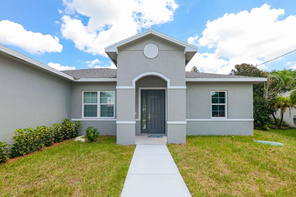 Photo of 2926 SE Buccaneer Circle, Port Saint Lucie, FL 34952 (MLS # R11015782)