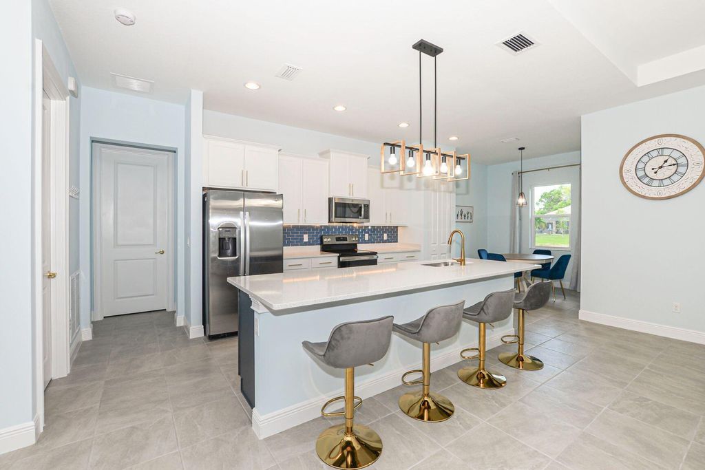 Photo of 2926 SE Buccaneer Circle, Port Saint Lucie, FL 34952 (MLS # R11015782)