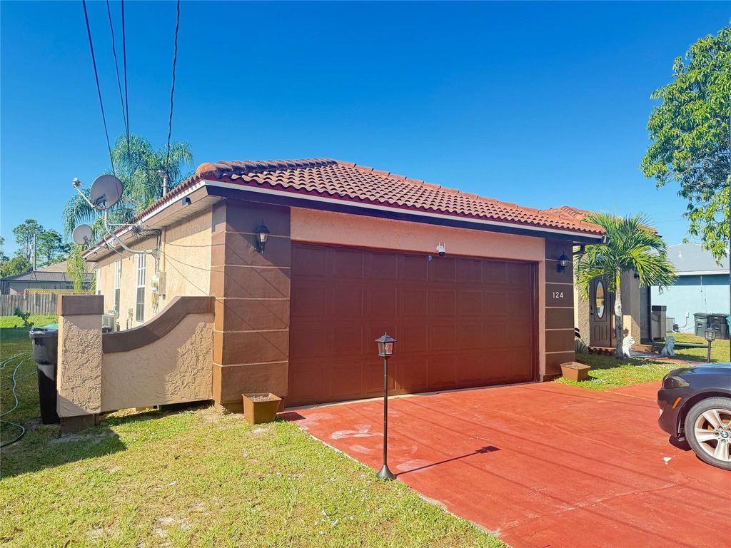 Photo of 124 SW Klee Circle, Port Saint Lucie, FL 34953 (MLS # F10541575)