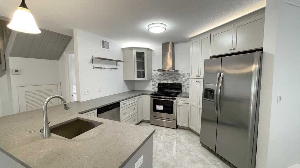 Photo of 117 Seabreeze Circle, Jupiter, FL 33477 (MLS # R11164121)