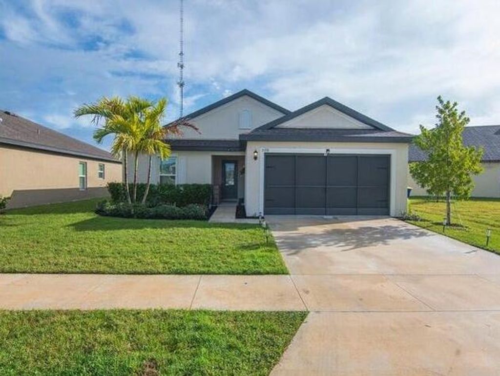 Photo of 5318 Imagination Drive, Fort Pierce, FL 34947 (MLS # R10982237)