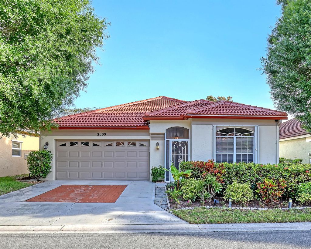 Photo of 2009 Bonisle Circle, Riviera Beach, FL 33418 (MLS # R10973235)