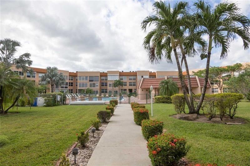 Photo of 6770 Royal Palm Boulevard #305L, Margate, FL 33063 (MLS # B26094780)
